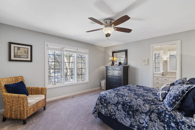 3111 Turnberry Road St. Charles, IL 60174 - Photo 19 of 34 a bedroom with a bed dresser and a window