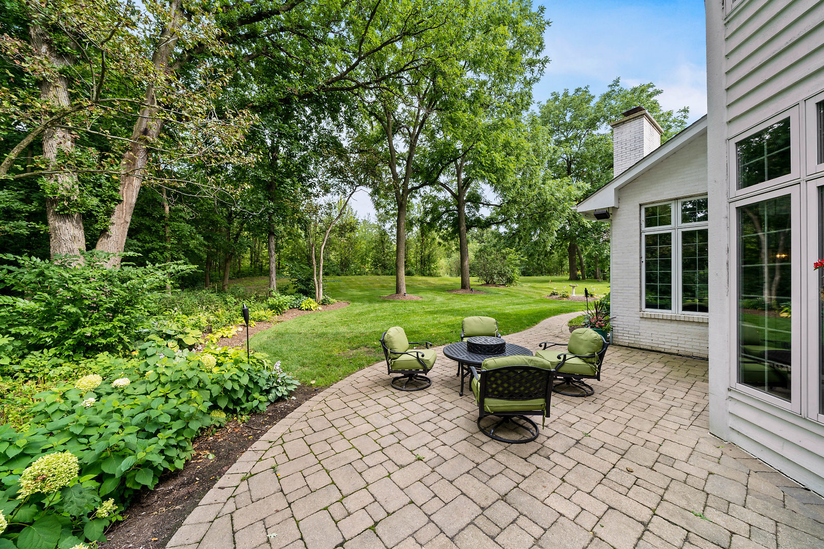 3111 Turnberry Road St. Charles, IL 60174 - Photo 29 of 34 a view of a patio with table and chairs and potted plants