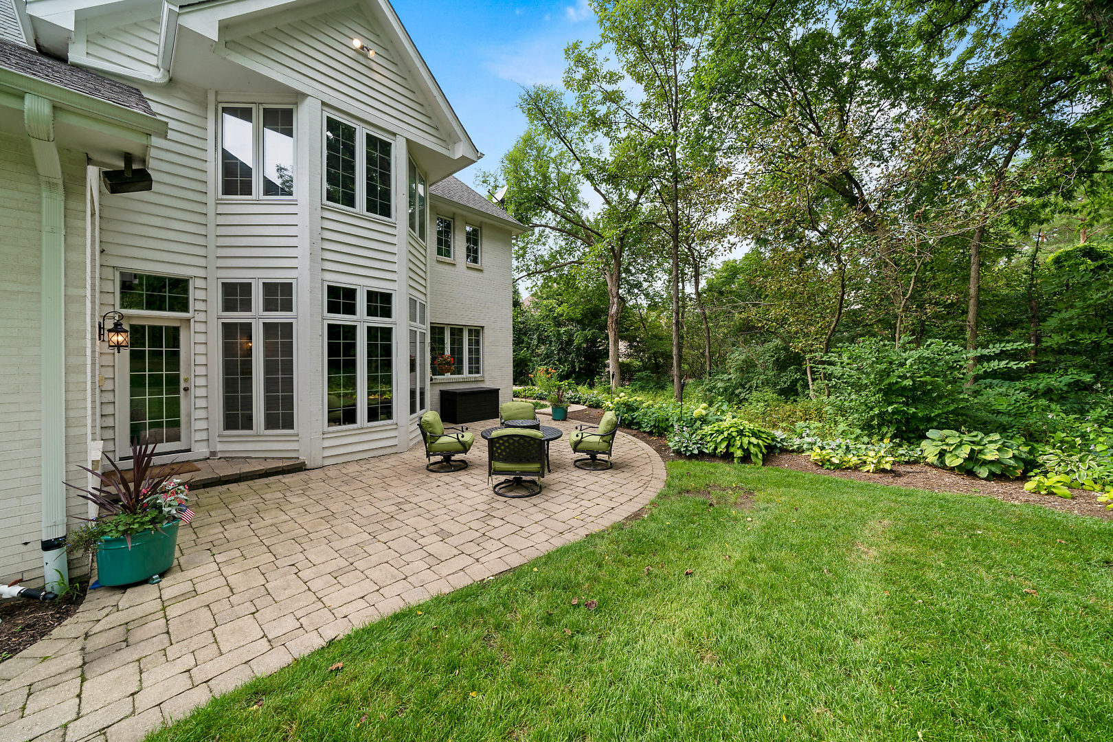 3111 Turnberry Road St. Charles, IL 60174 - Photo 30 of 34 a view of a house with backyard sitting area and garden