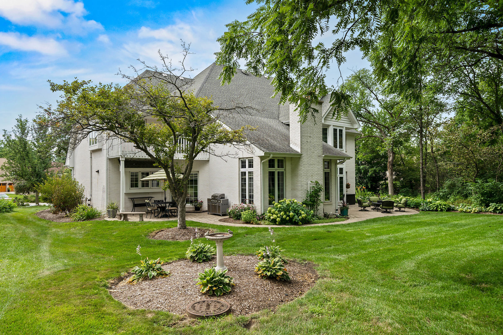 3111 Turnberry Road St. Charles, IL 60174 - Photo 32 of 34 a front view of a house with garden and trees