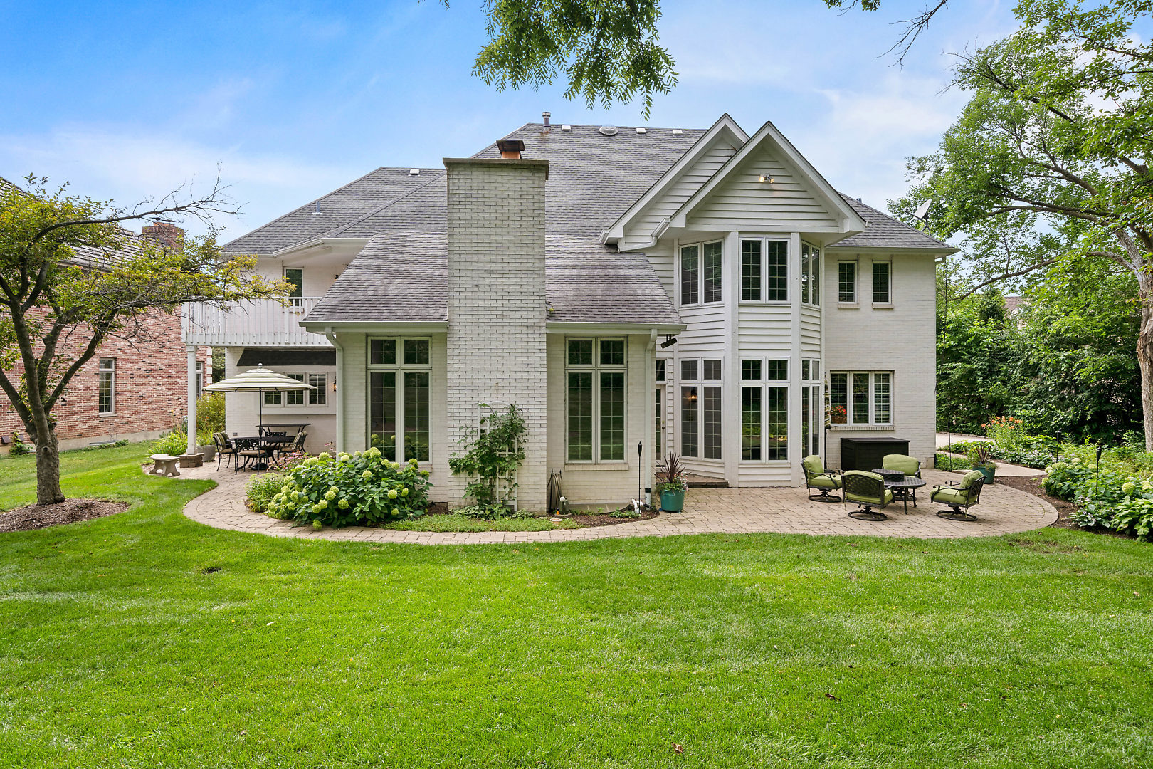 3111 Turnberry Road St. Charles, IL 60174 - Photo 33 of 34 a front view of a house with a garden and plants