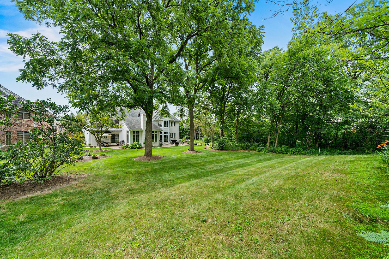 3111 Turnberry Road St. Charles, IL 60174 - Photo 34 of 34 a view of a grassy field with trees in the background