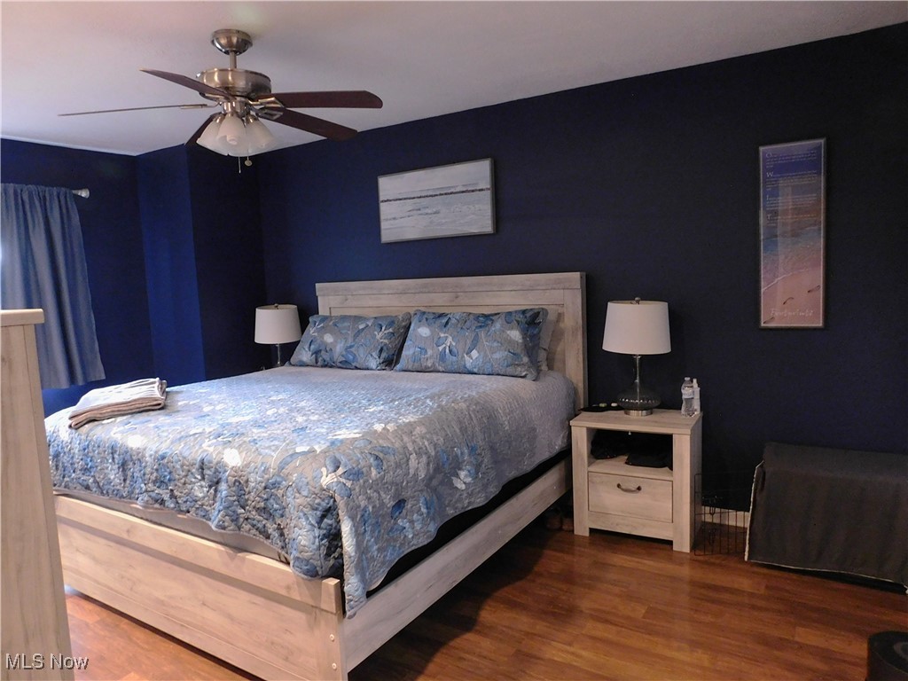 987 Hampton Ridge Drive Akron, OH 44313 - Photo 31 of 49 Bedroom featuring wood finished floors and ceiling fan