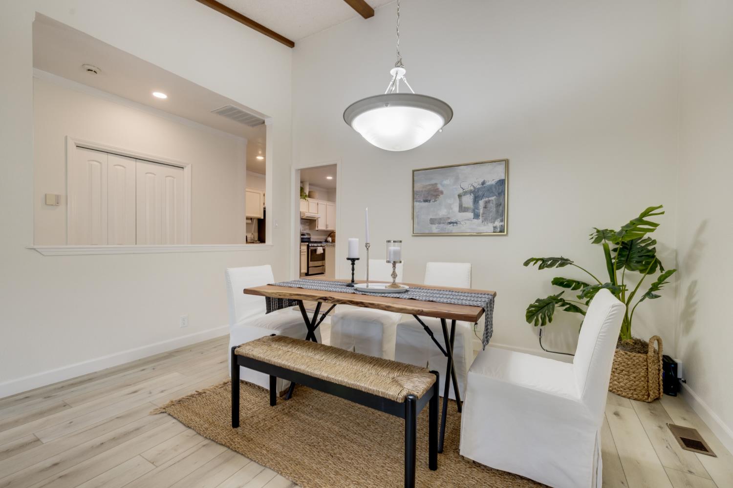 7118 Murdock Way Carmichael, CA 95608 - Photo 7 of 31 Dining Room area with vaulted ceilings adjacent to Living Room.