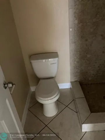 a bathroom with a toilet