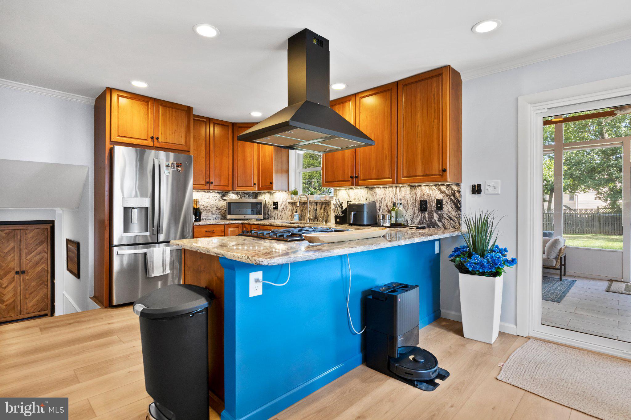 6705 New Hope Drive Springfield, VA 22151 - Photo 21 of 67 Modern kitchen with vibrant accents.