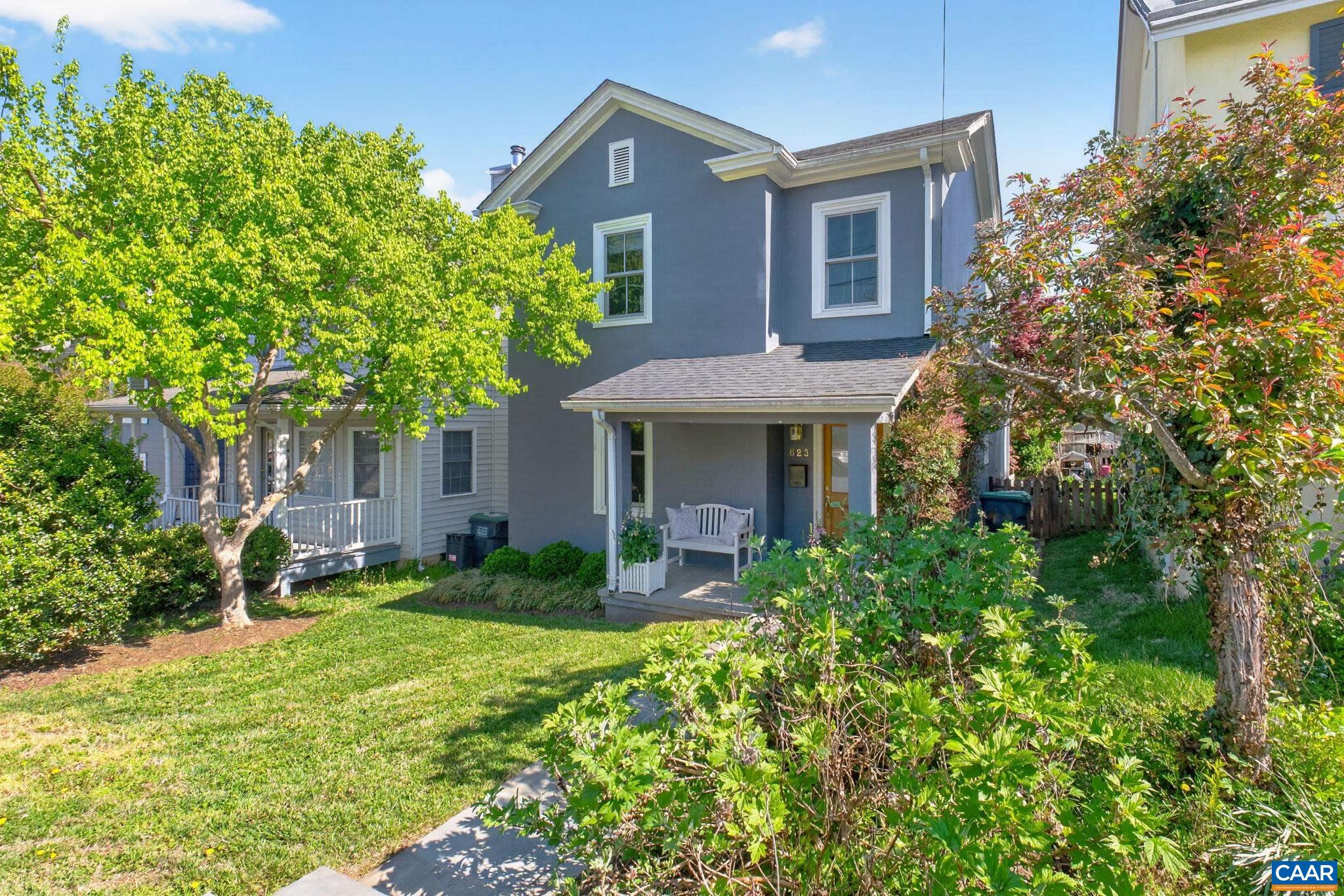 623 Hinton Avenue Charlottesville, VA 22902 - Photo 1 of 35 a front view of a house with garden