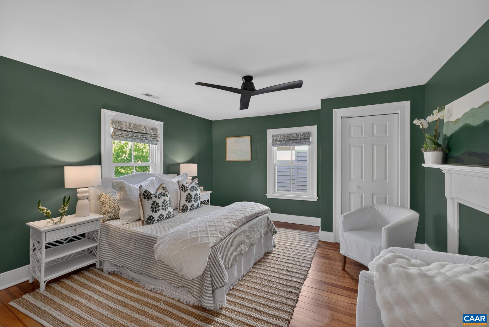 623 Hinton Avenue Charlottesville, VA 22902 - Photo 23 of 35 a bedroom with a bed and a couch