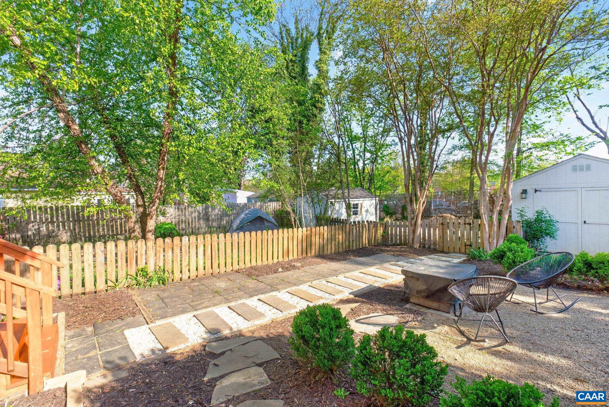 623 Hinton Avenue Charlottesville, VA 22902 - Photo 30 of 35 a view of a backyard with a large tree