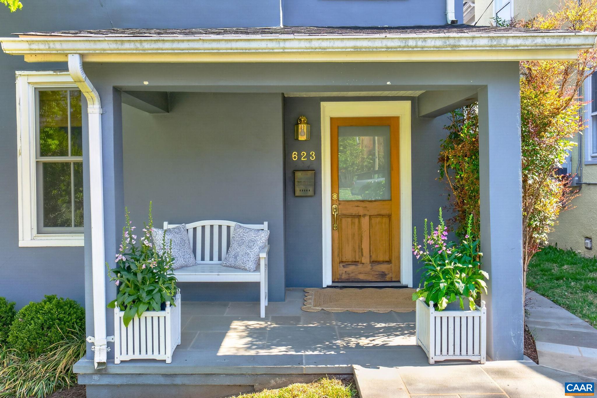 623 Hinton Avenue Charlottesville, VA 22902 - Photo 3 of 35 a view of front door of house with potted plants