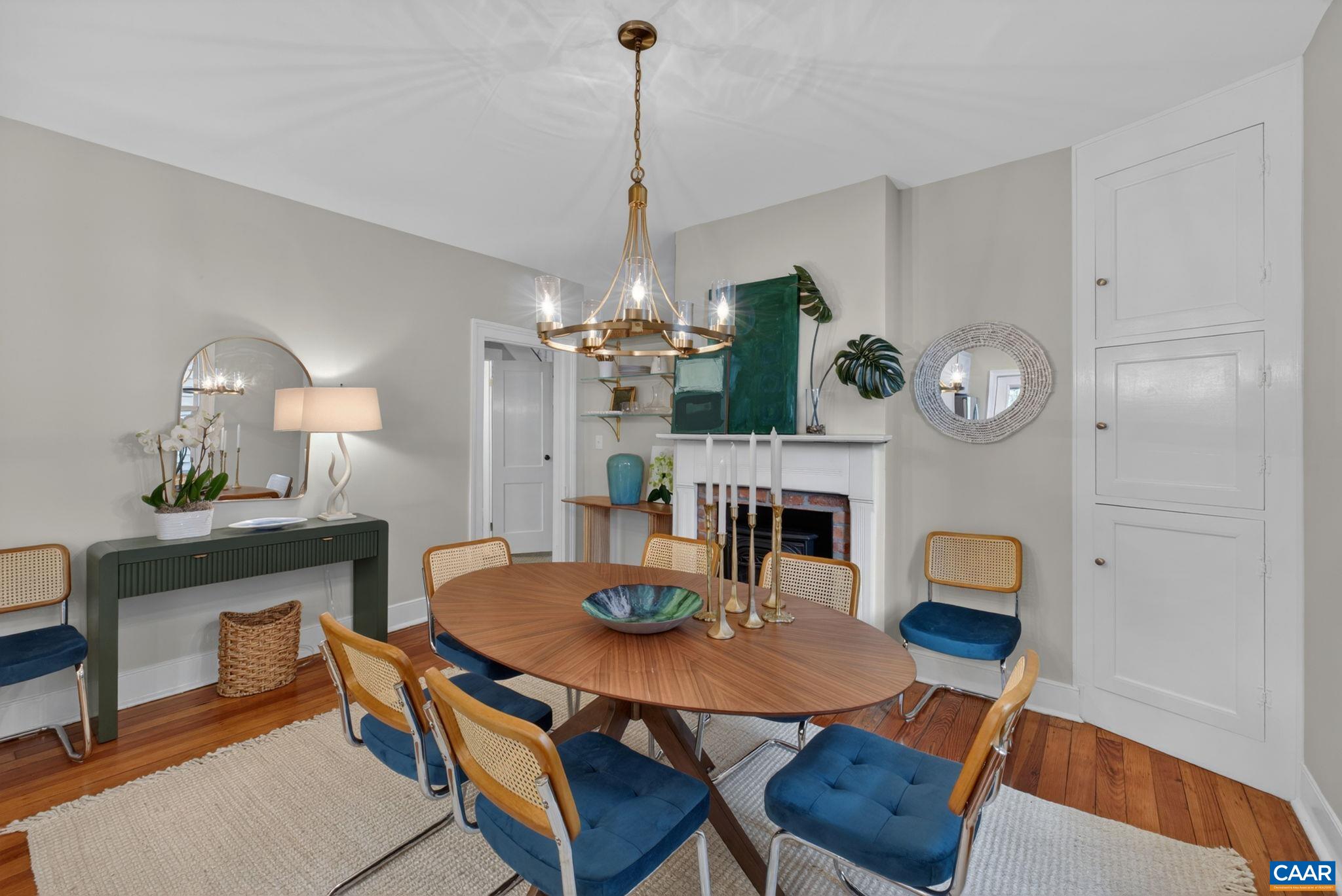 623 Hinton Avenue Charlottesville, VA 22902 - Photo 10 of 35 a view of a dining room with furniture and wooden floor