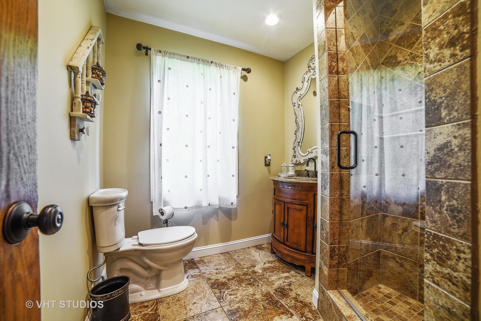 972 High Point Lane Streamwood, IL 60107 - Photo 12 of 26 a bathroom with a toilet and a shower