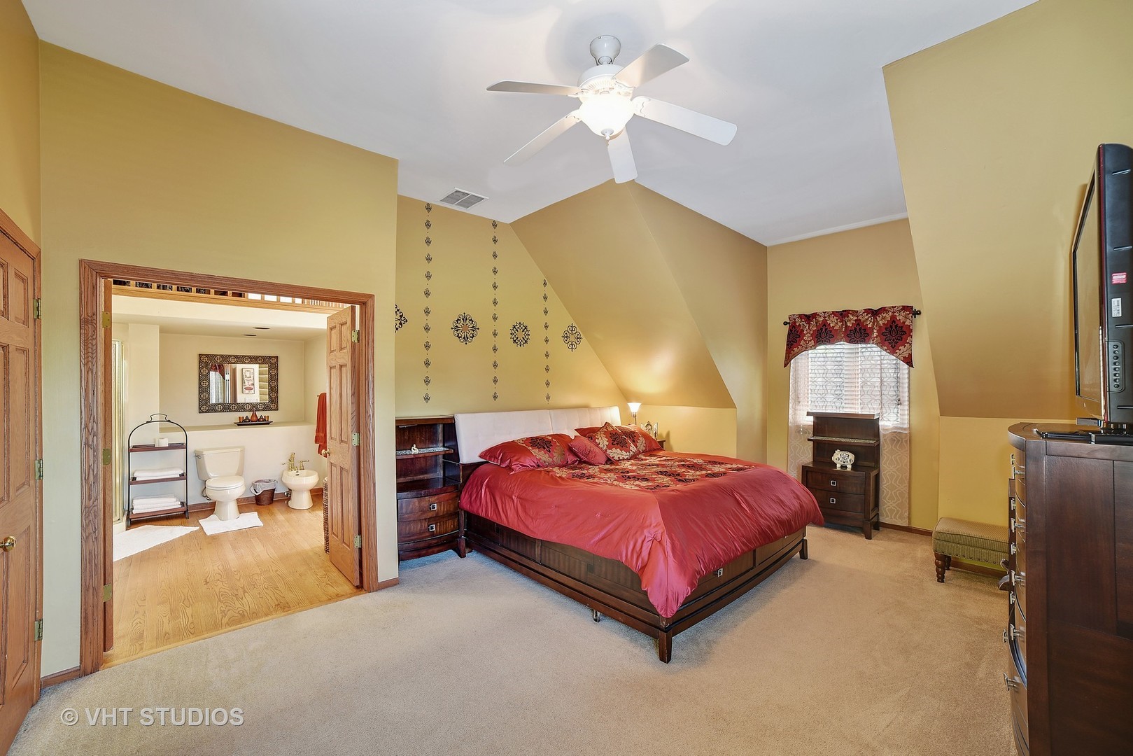 972 High Point Lane Streamwood, IL 60107 - Photo 15 of 26 a spacious bedroom with a bed and a chandelier