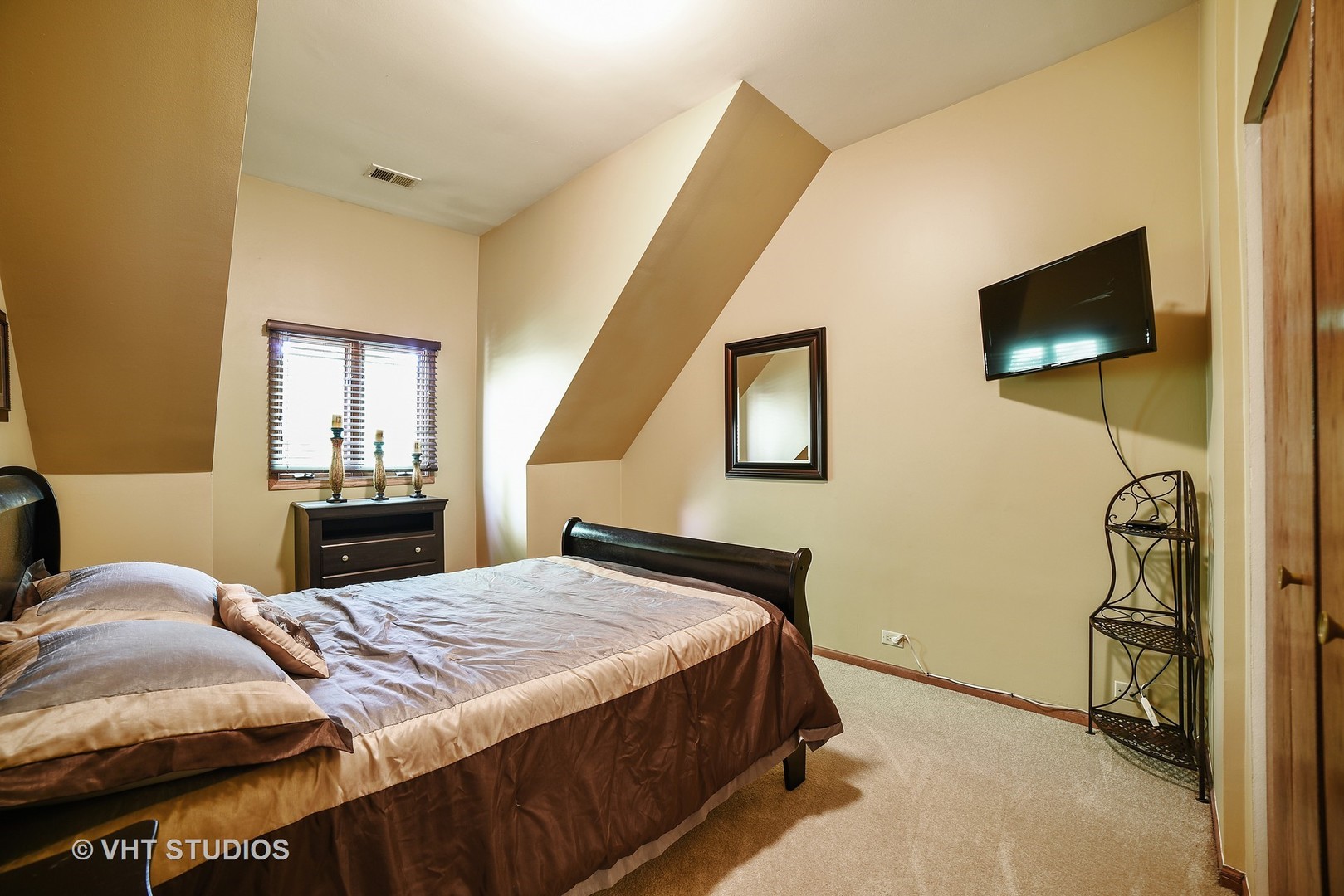 972 High Point Lane Streamwood, IL 60107 - Photo 21 of 26 a bedroom with a bed and a flat screen tv