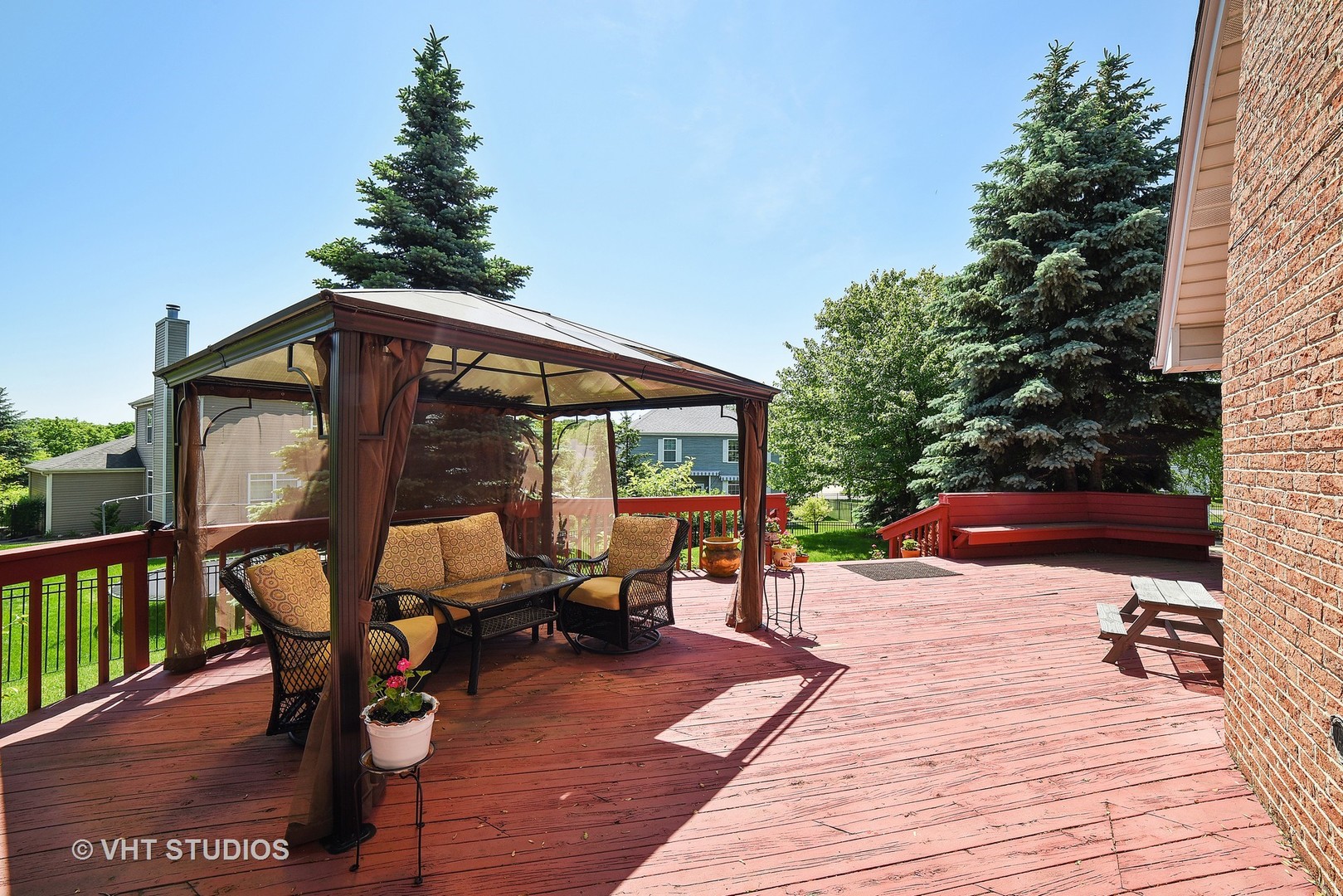 972 High Point Lane Streamwood, IL 60107 - Photo 23 of 26 a patio with hardwood table and chairs