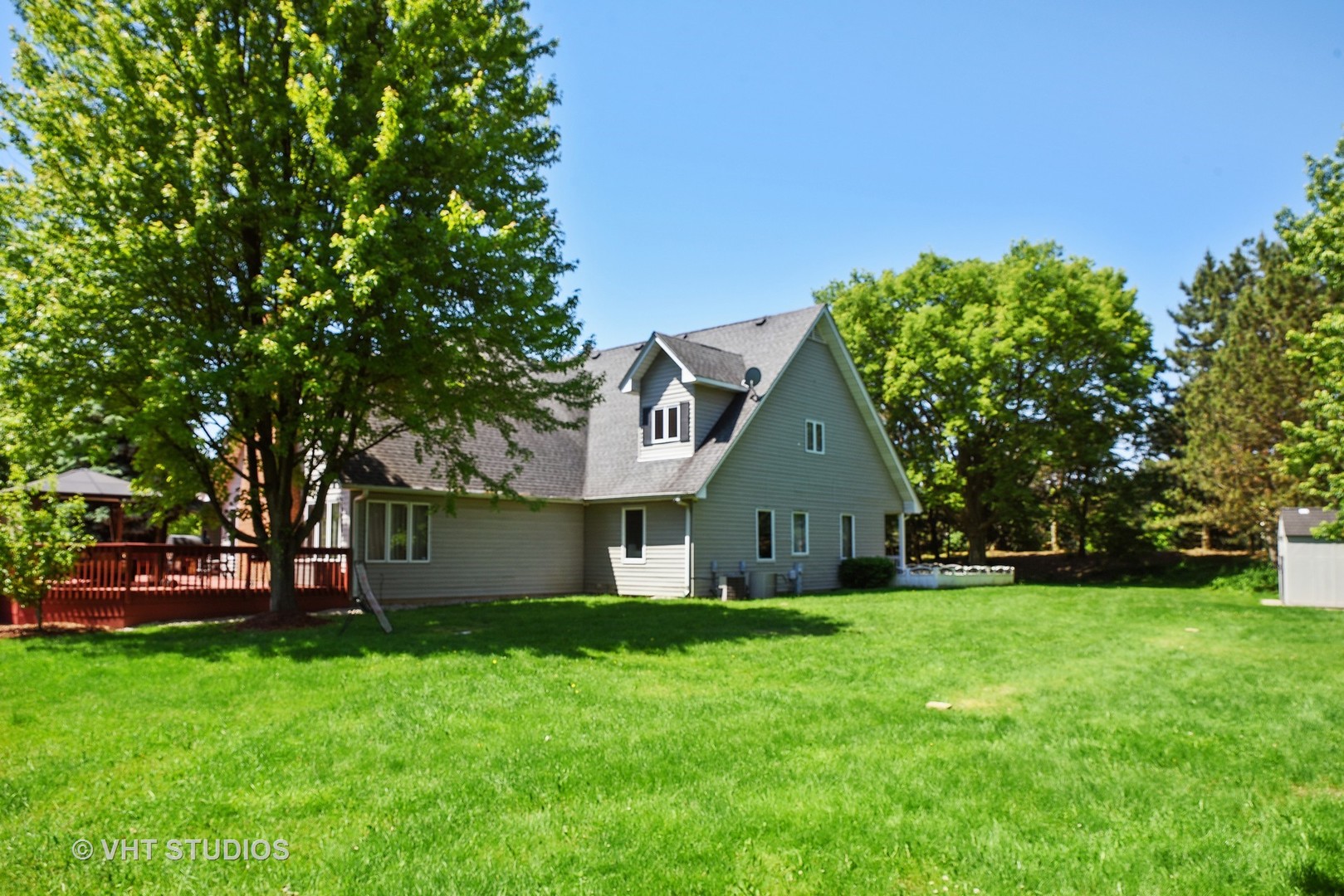 972 High Point Lane Streamwood, IL 60107 - Photo 25 of 26 a front view of house with yard and green space