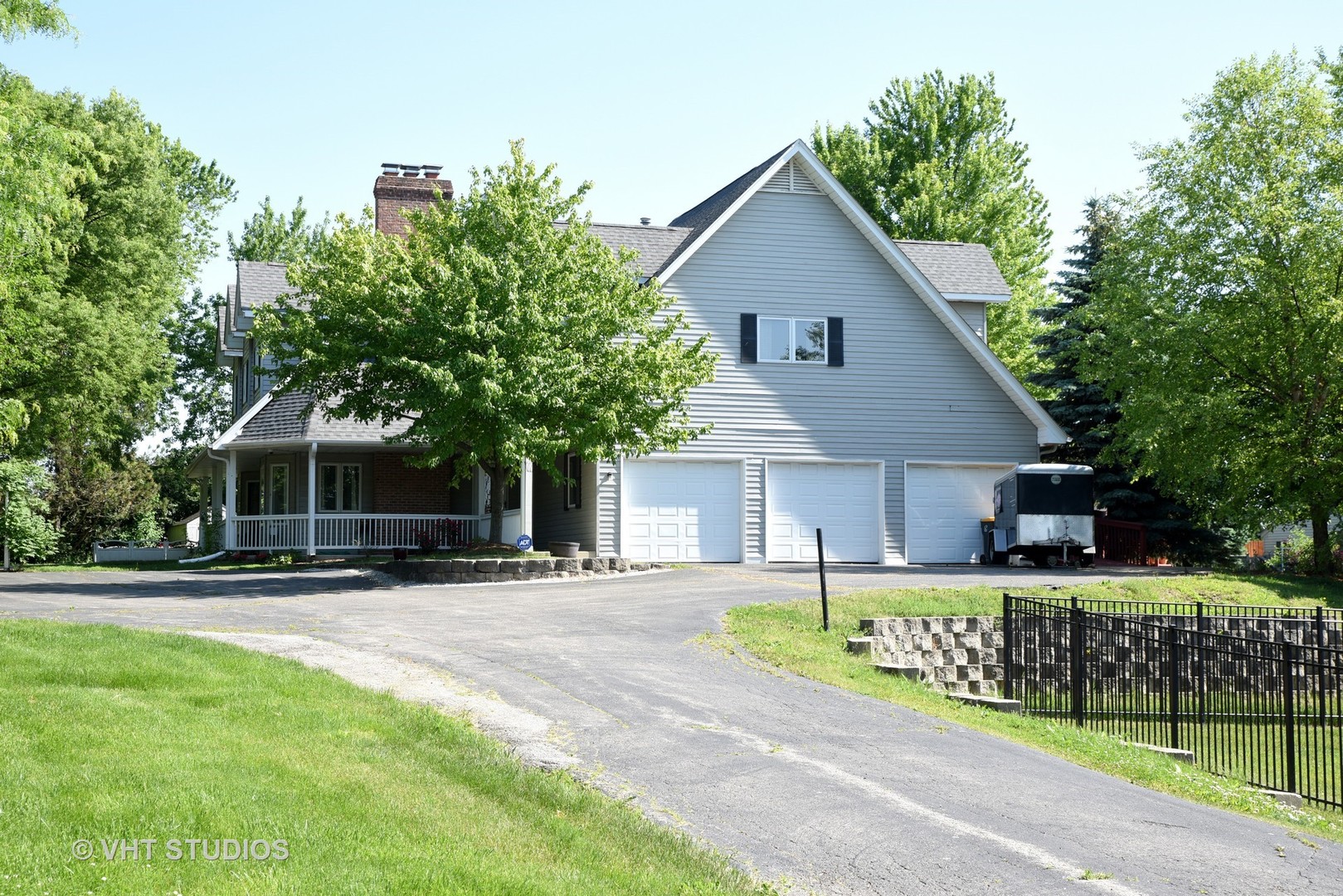 972 High Point Lane Streamwood, IL 60107 - Photo 6 of 26 a front view of house with yard and green space