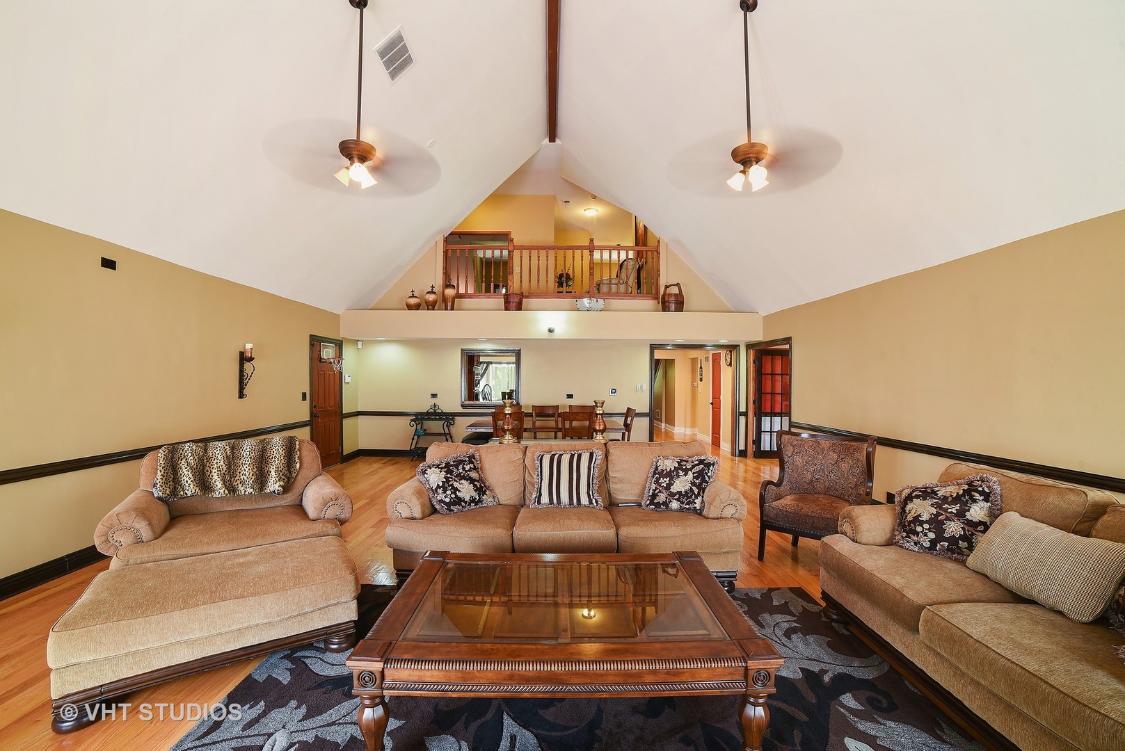 972 High Point Lane Streamwood, IL 60107 - Photo 8 of 26 a living room with furniture and a chandelier