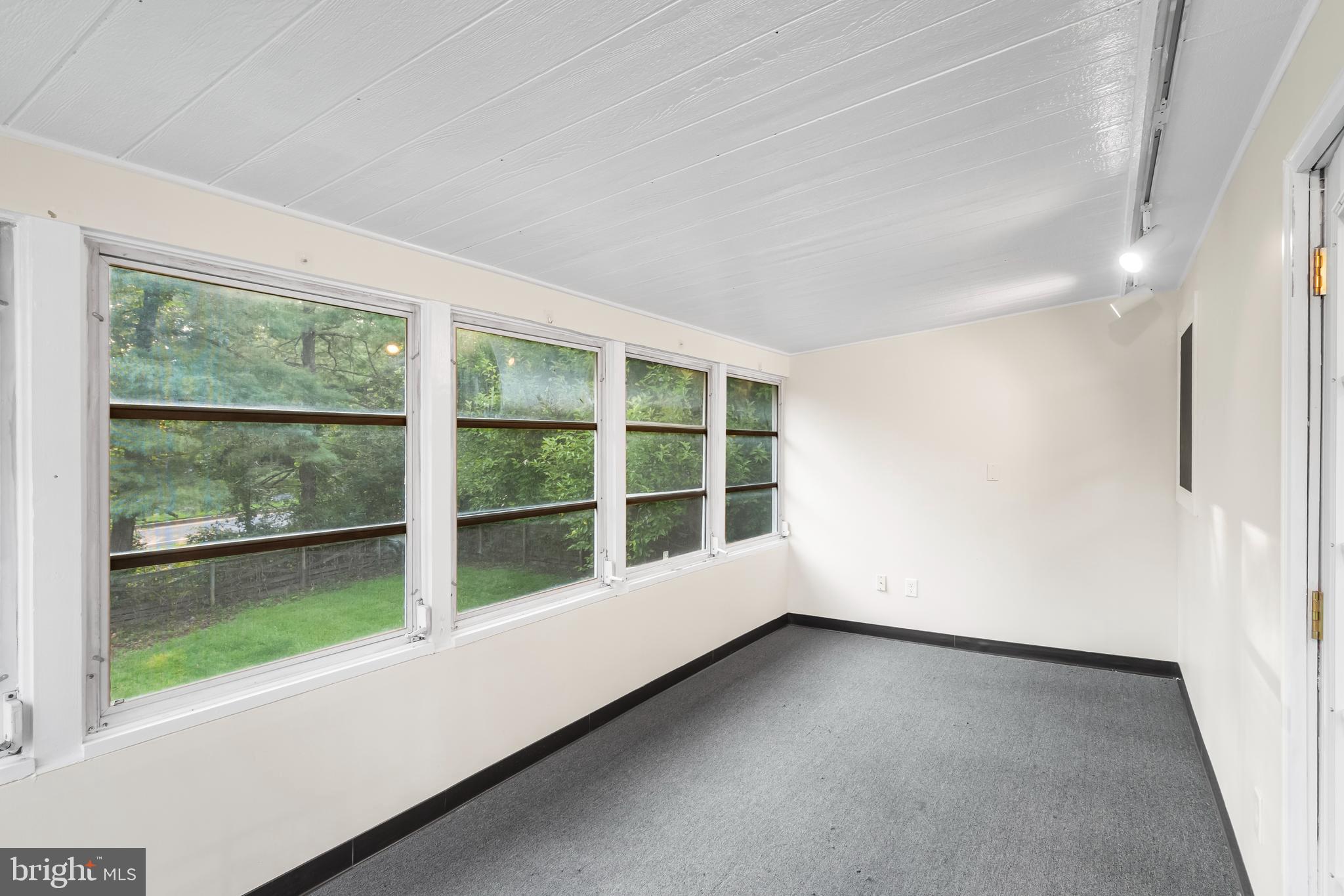 126 Doncaster Road Joppa, MD 21085 - Photo 6 of 23 a view of an empty room with a window