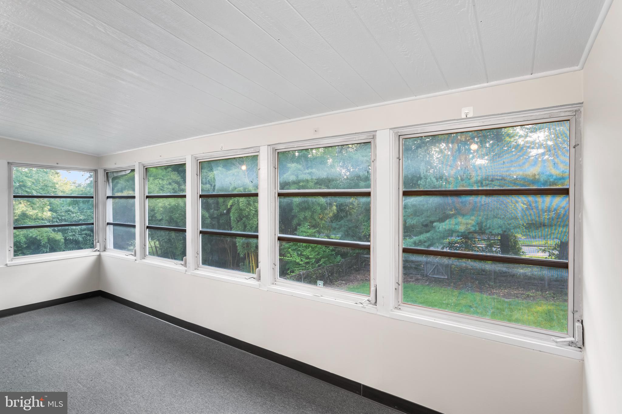 126 Doncaster Road Joppa, MD 21085 - Photo 8 of 23 a view of an empty room with a window