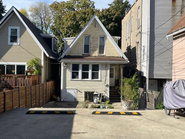 a front view of a house with yard