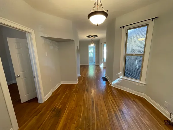 a view of gallery with wooden floor