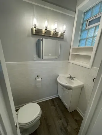 a bathroom with a sink and mirror