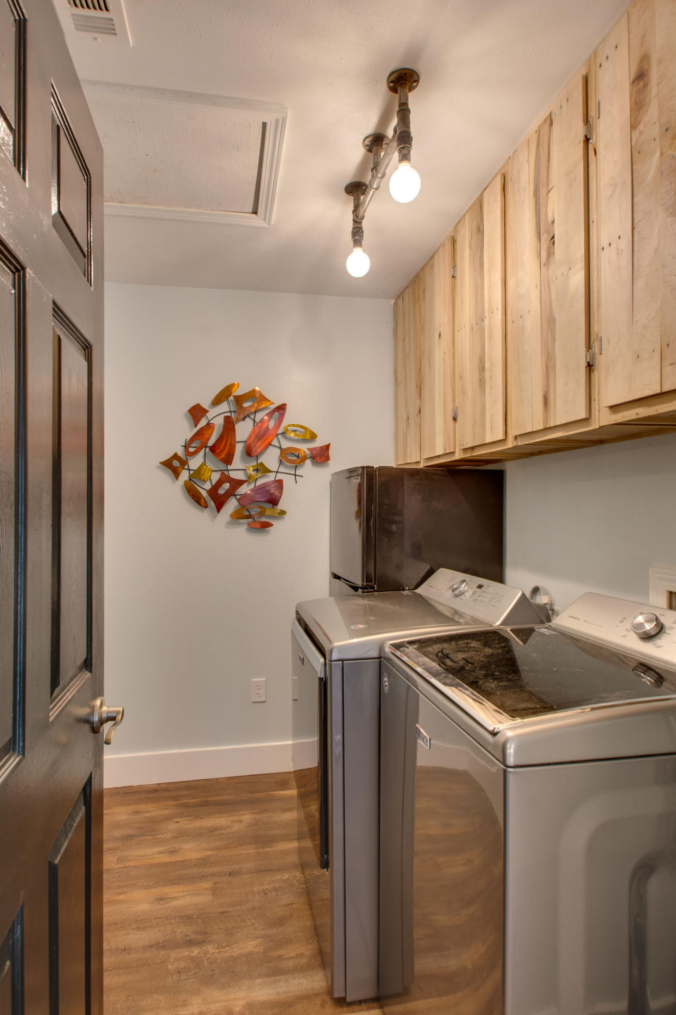 1146 Bay Court Destin, FL 32541 - Photo 14 of 32 a kitchen with stainless steel appliances granite countertop a stove a sink and a microwave