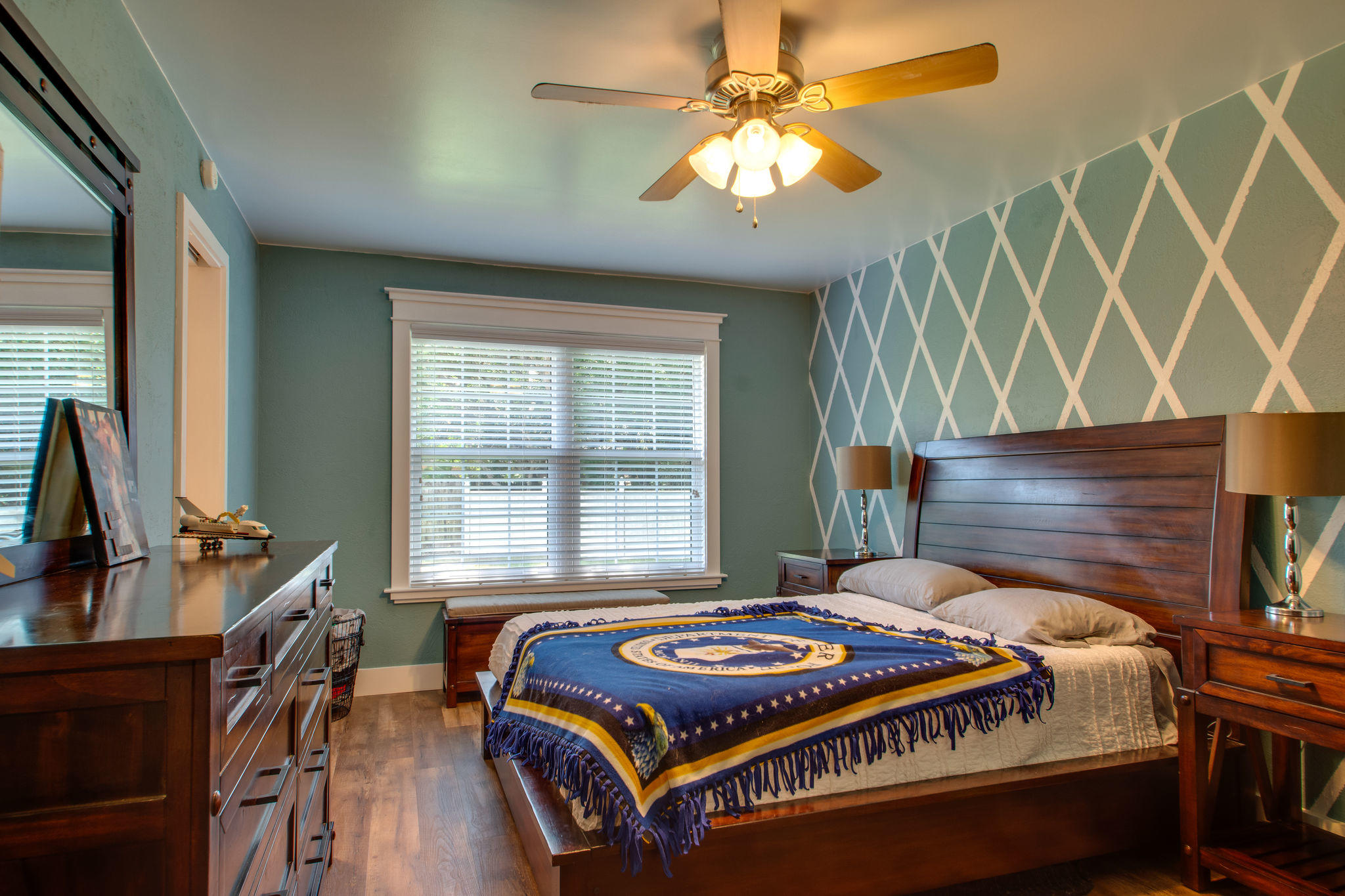 1146 Bay Court Destin, FL 32541 - Photo 18 of 32 a bedroom with a bed and a flat tv screen on dresser