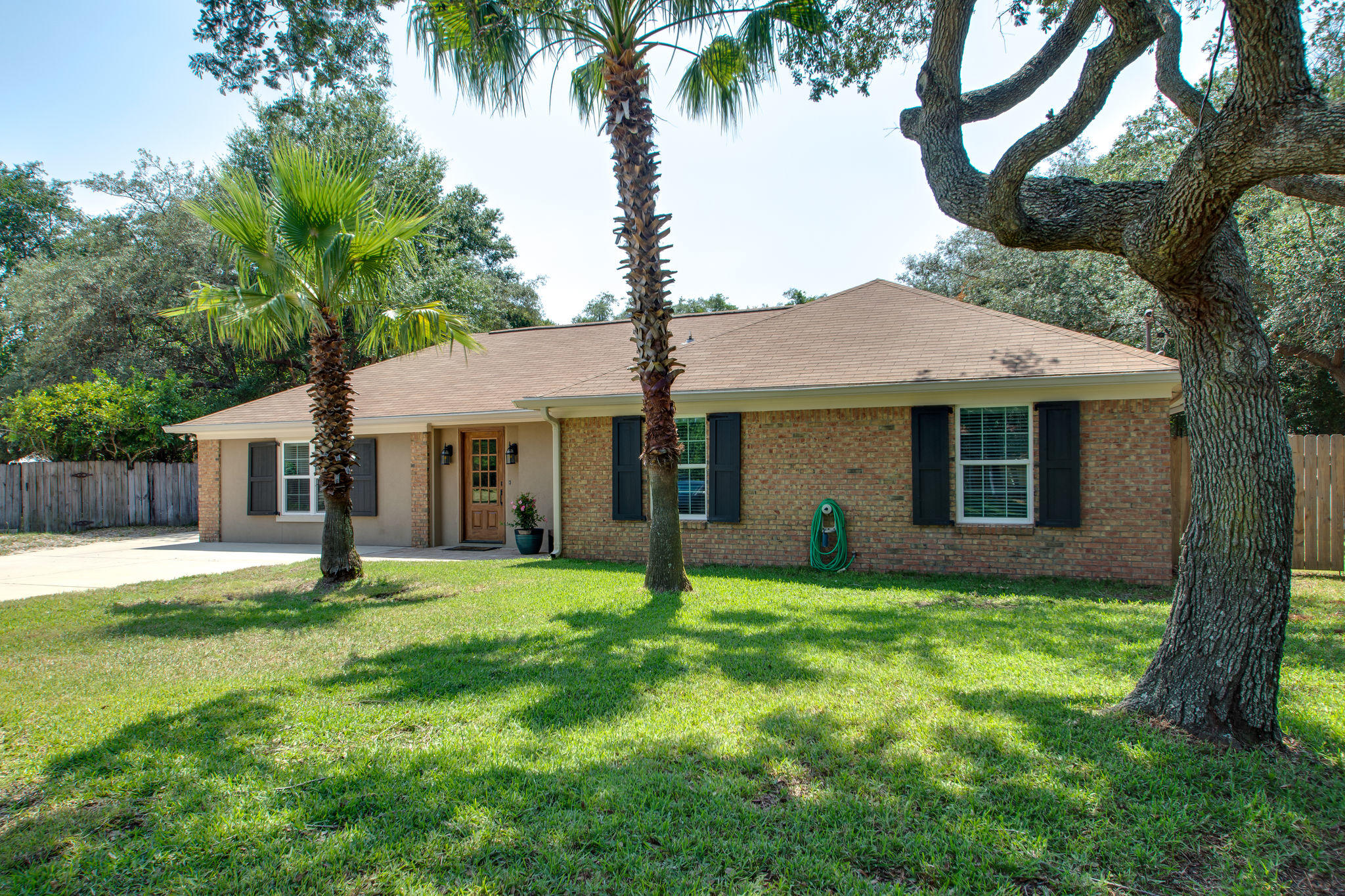 1146 Bay Court Destin, FL 32541 - Photo 2 of 32 a house that has a big yard in front of it