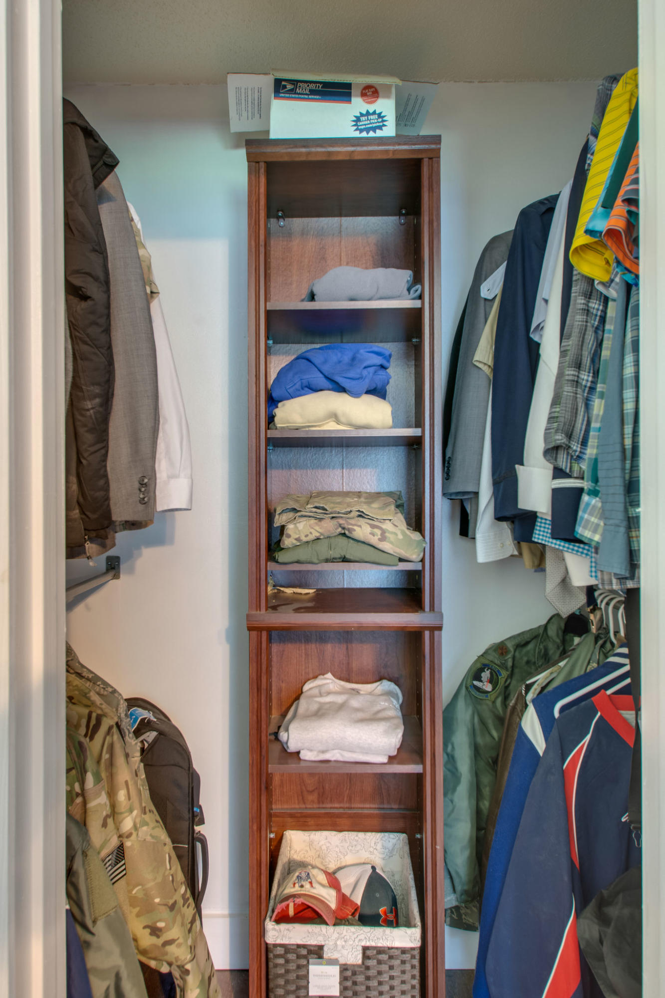 1146 Bay Court Destin, FL 32541 - Photo 21 of 32 a view of walk in closet with clothes and shoes