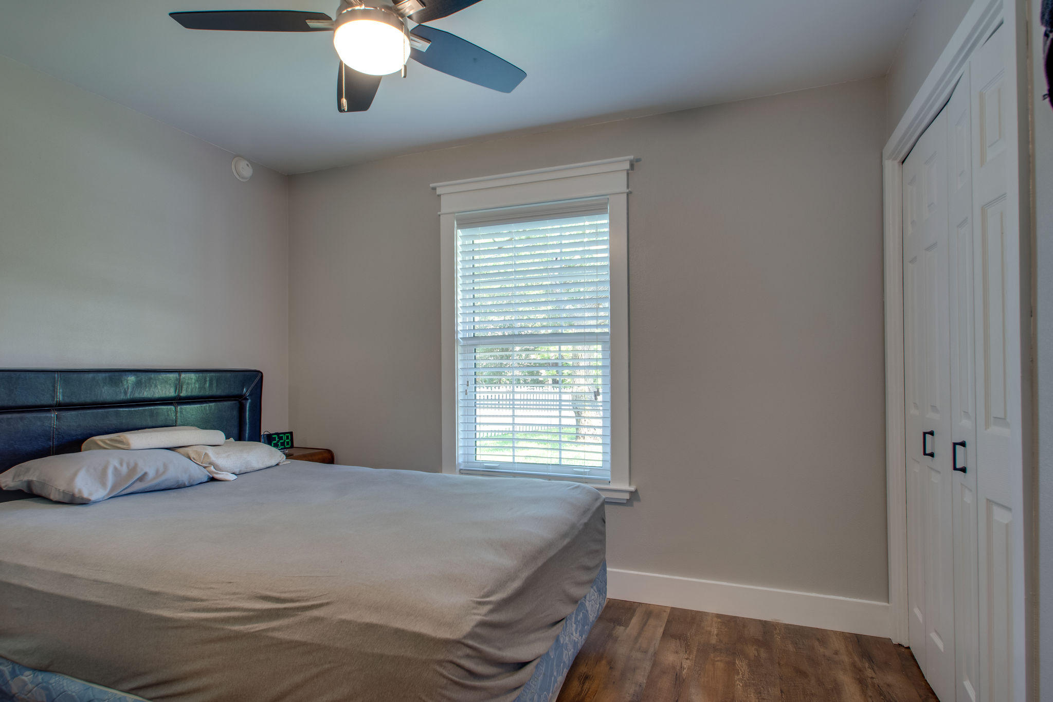 1146 Bay Court Destin, FL 32541 - Photo 22 of 32 a bedroom with a bed and a chandelier