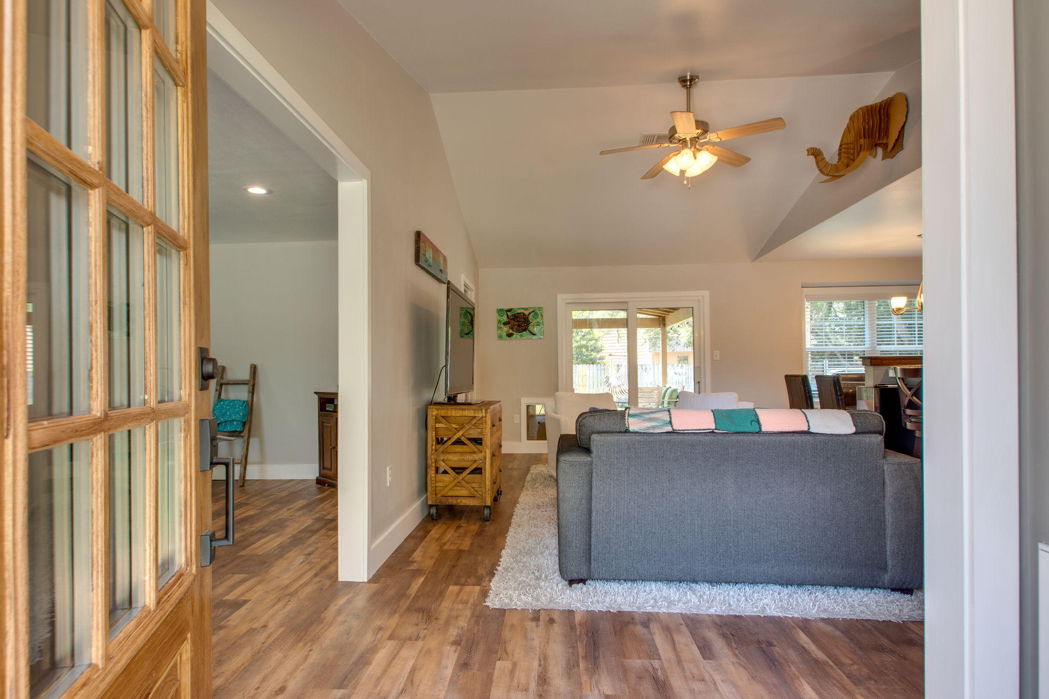 1146 Bay Court Destin, FL 32541 - Photo 6 of 32 a view of a dining room with furniture window and wooden floor