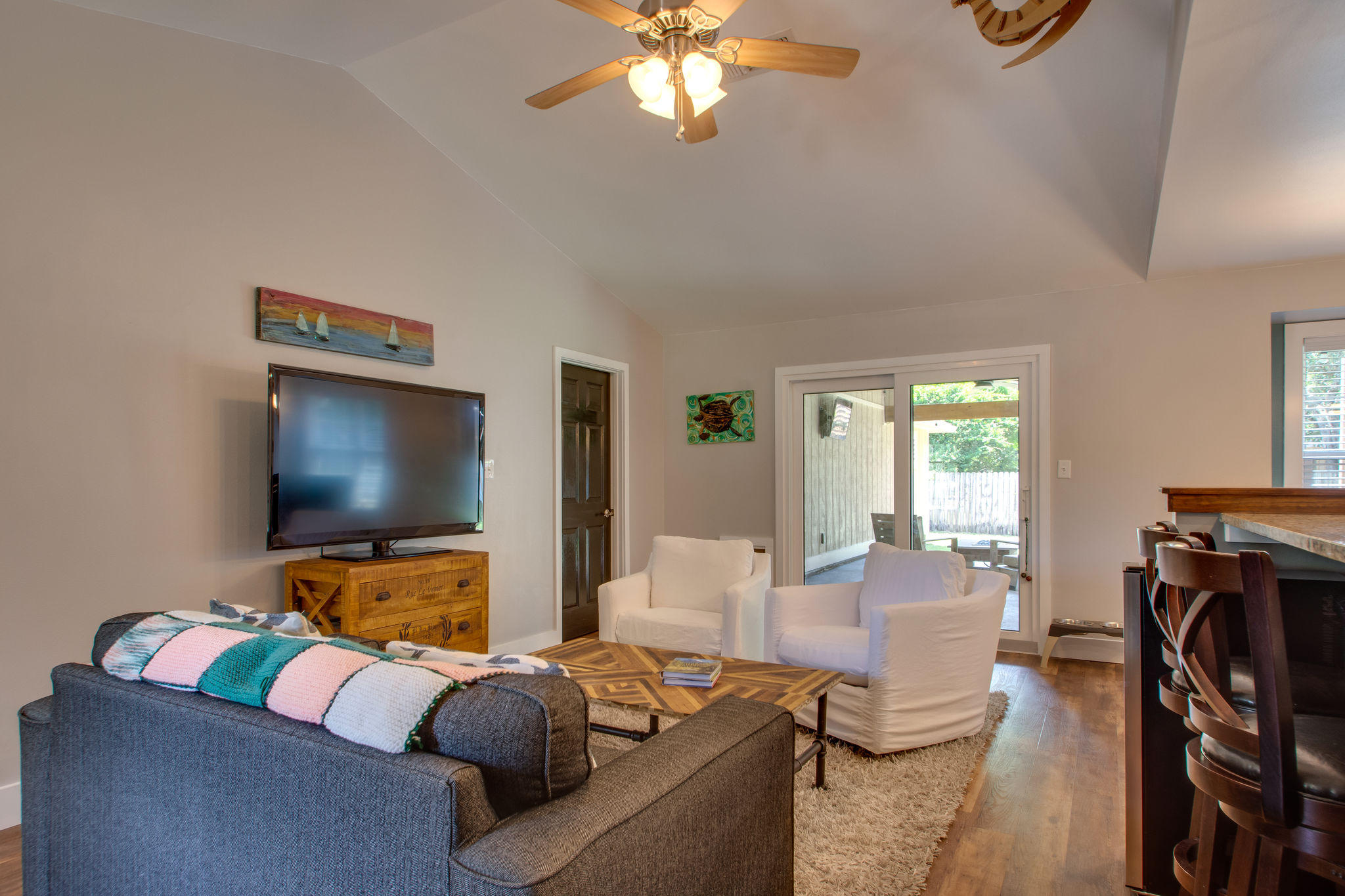 1146 Bay Court Destin, FL 32541 - Photo 7 of 32 a living room with furniture and a flat screen tv