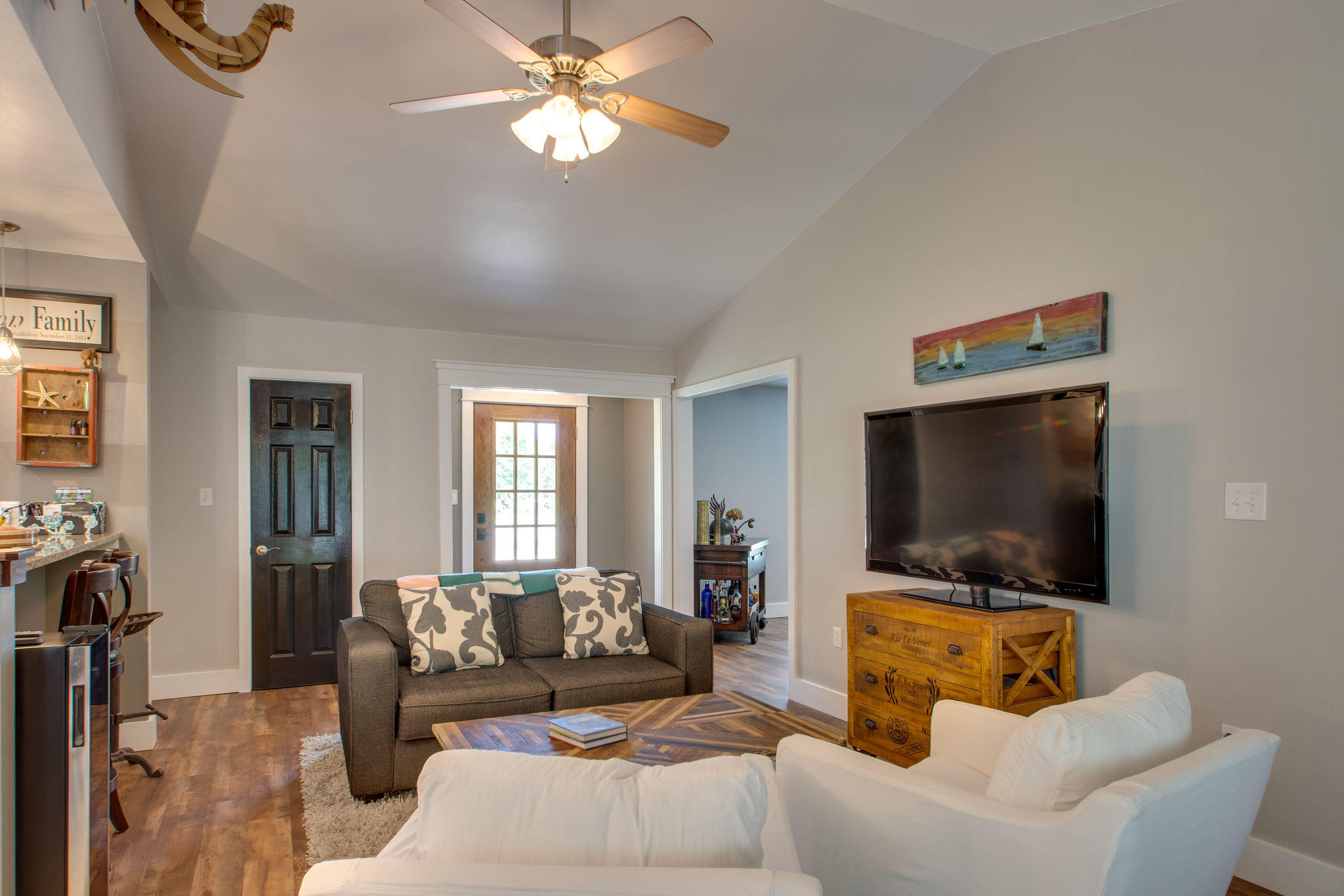 1146 Bay Court Destin, FL 32541 - Photo 8 of 32 a living room with furniture and a flat screen tv