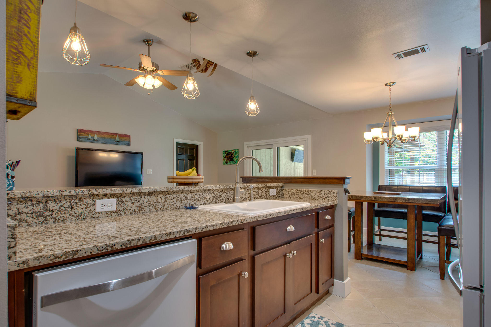 1146 Bay Court Destin, FL 32541 - Photo 10 of 32 a bathroom with a granite countertop sink and a large mirror