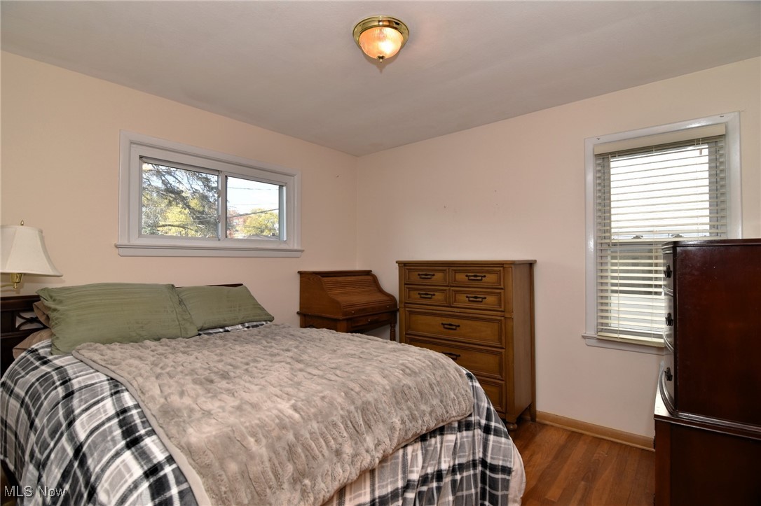 38535 Aurora Road Solon, OH 44139 - Photo 12 of 26 Bedroom featuring multiple windows and hardwood / wood-style flooring
