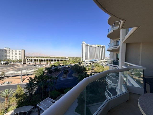 2777 Paradise Road, Unit 807 Las Vegas, NV 89109 - Photo 48 of 61 Panoramic views of the vibrant city and distant mountains from this elevated balcony.