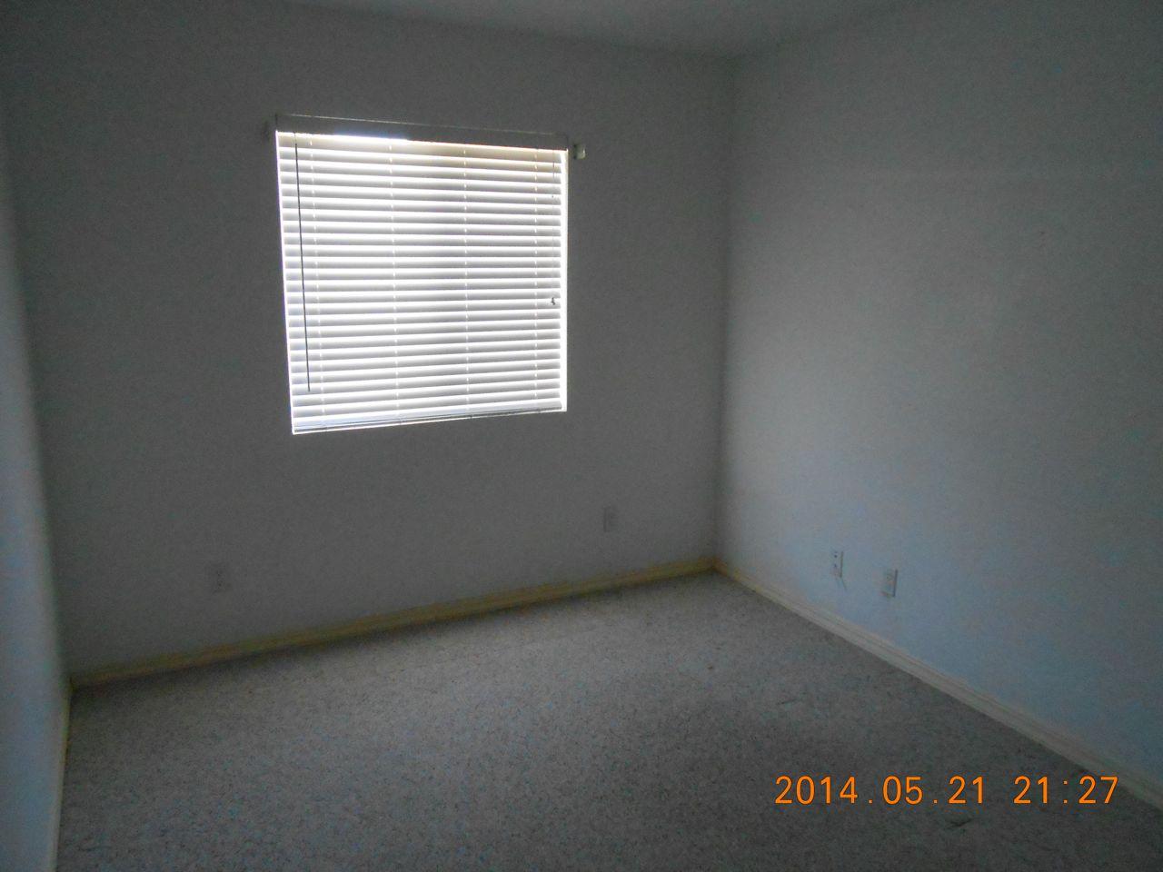 7072 Pit Road Redding, CA 96001 - Photo 7 of 20 an empty room with a window