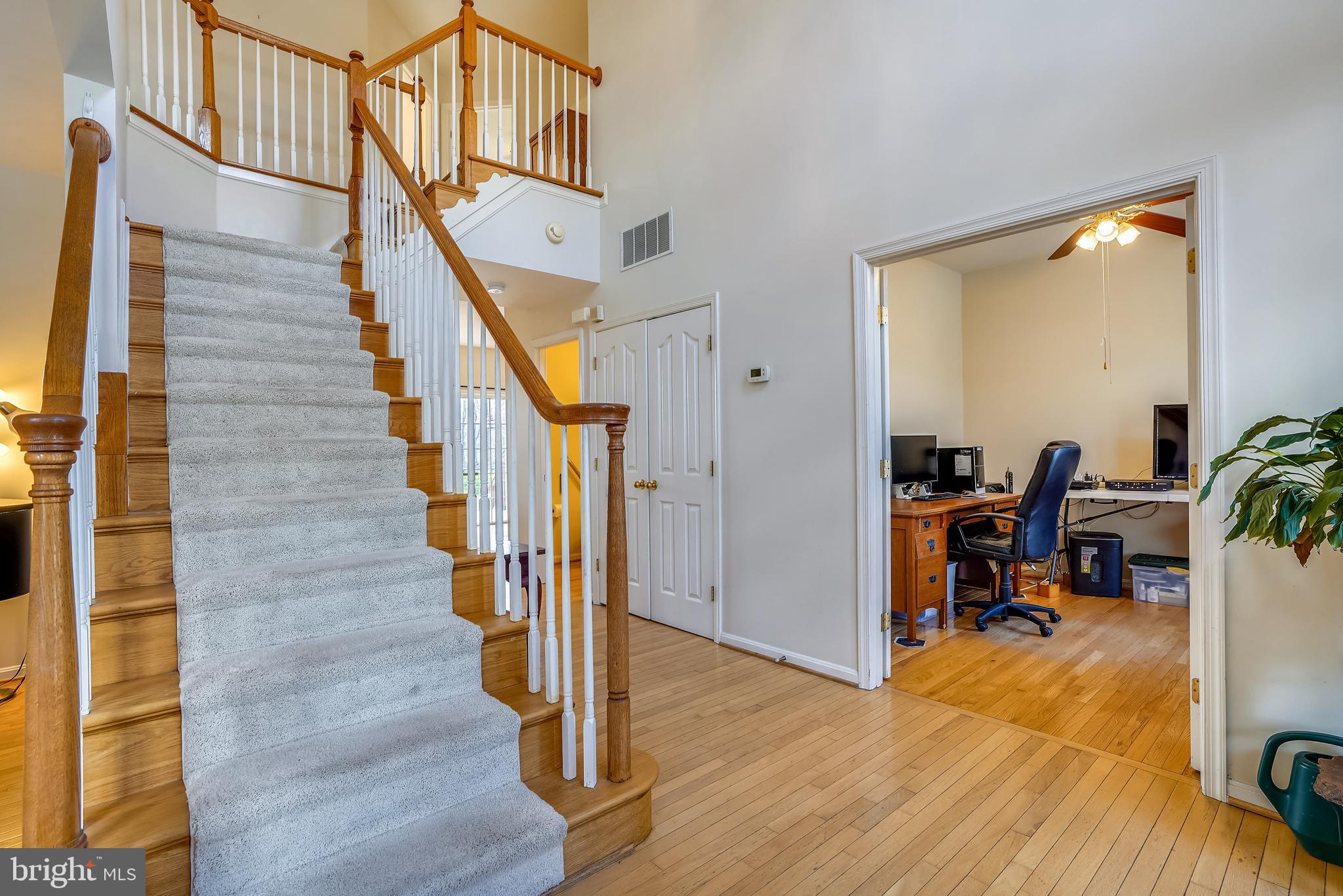 8004 Big Pool Road Laurel, MD 20724 - Photo 15 of 39 a view of entryway and hall with wooden floor