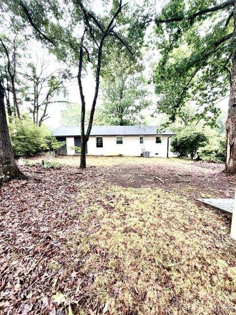1450 3rd Street Southwest Hickory, NC 28602 - Photo 16 of 17 a view of a yard with large trees