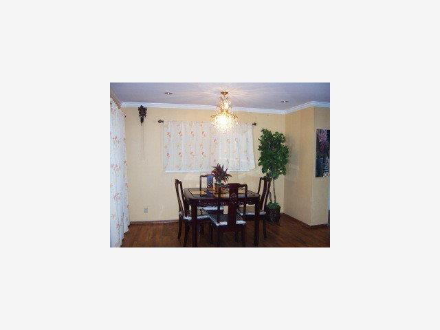 1033 West Riverside Way San Jose, CA 95129 - Photo 5 of 9 a view of a dining room with a table and chairs