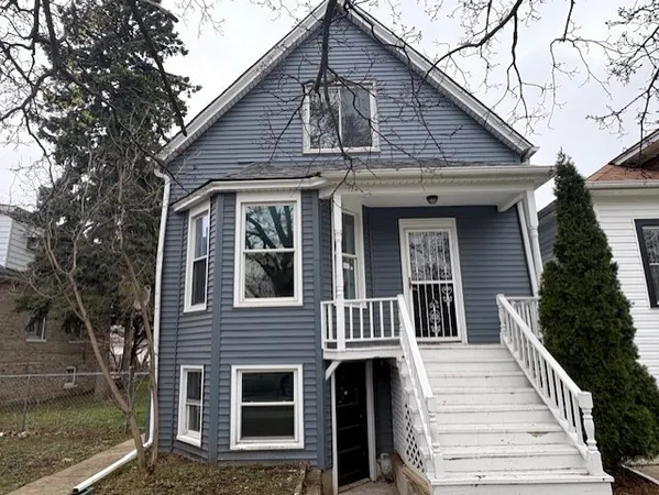 a front view of a house with a porch