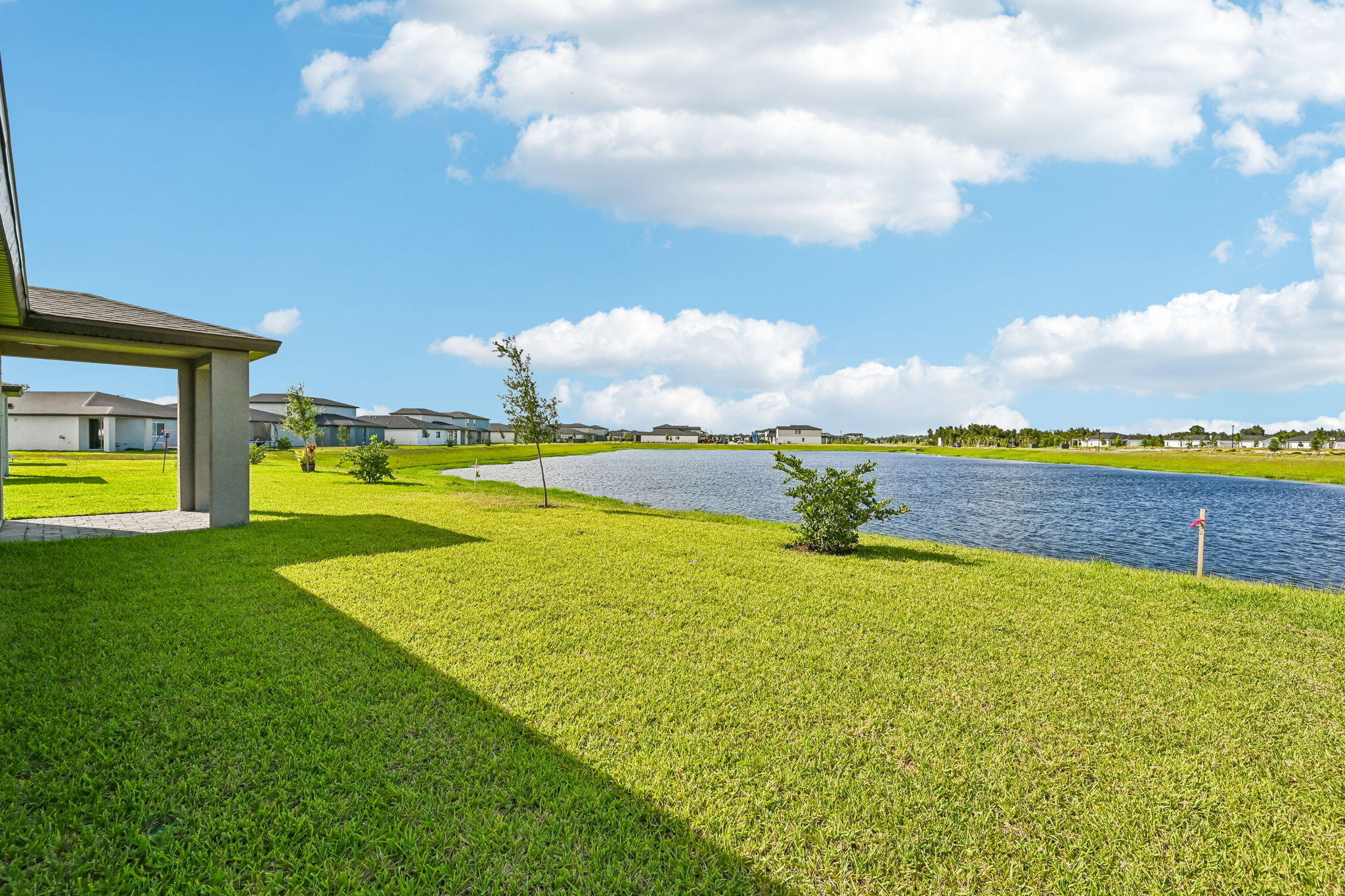 14503 Southwest New Dawn Road Indiantown, FL 34956 - Photo 36 of 42 a view of a swimming pool with an ocean view