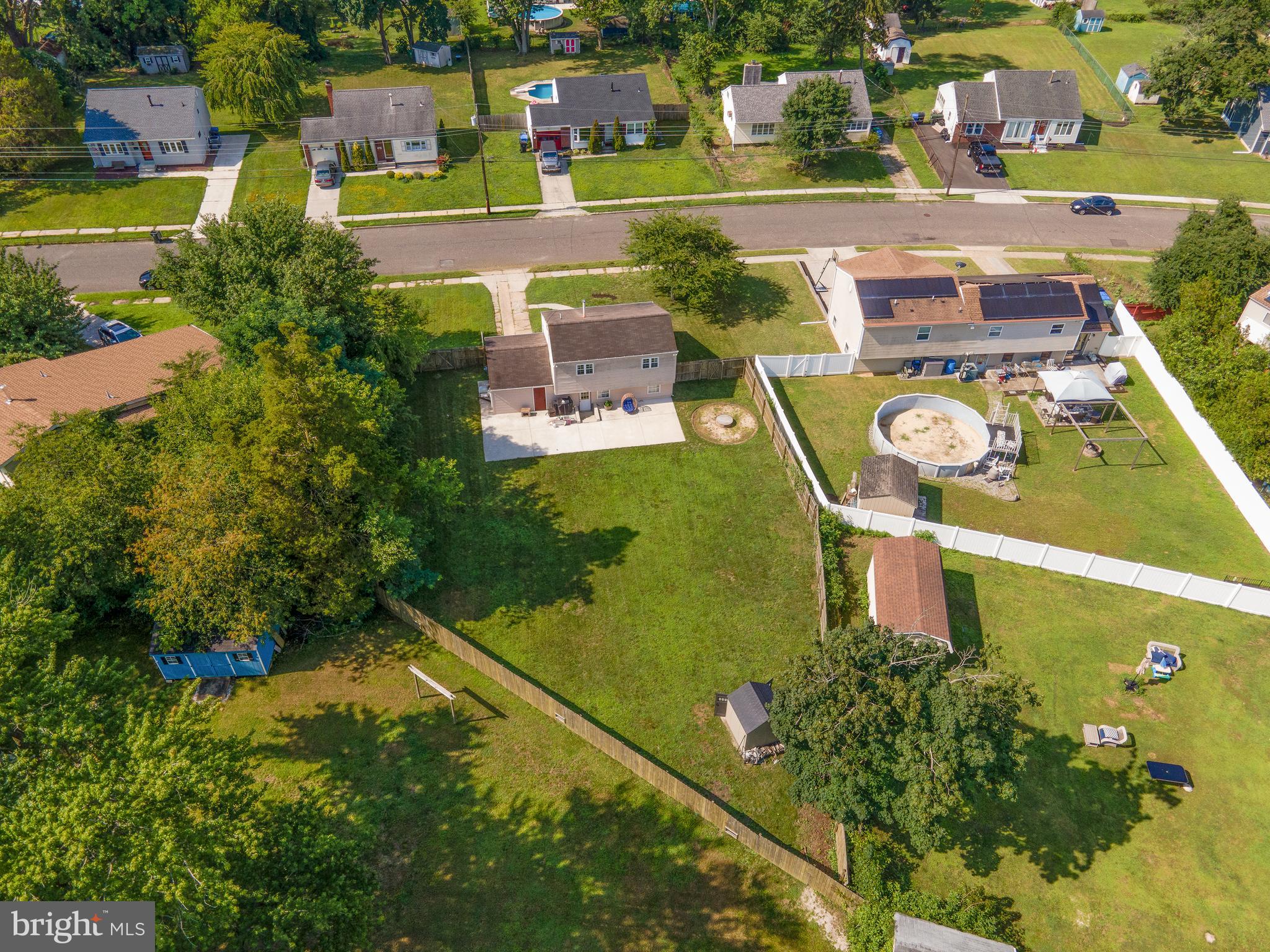276 Madison Road Mantua, NJ 08051 - Photo 6 of 30 an aerial view of a house with outdoor space swimming pool and lake view