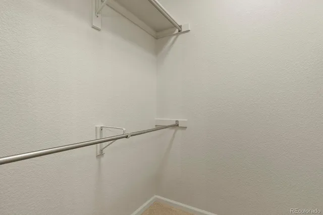 a view of small space with racks on the wall