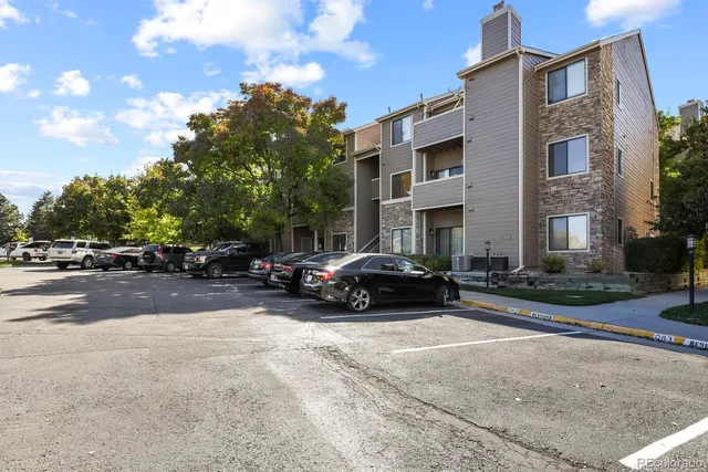 a view of street with parked cars
