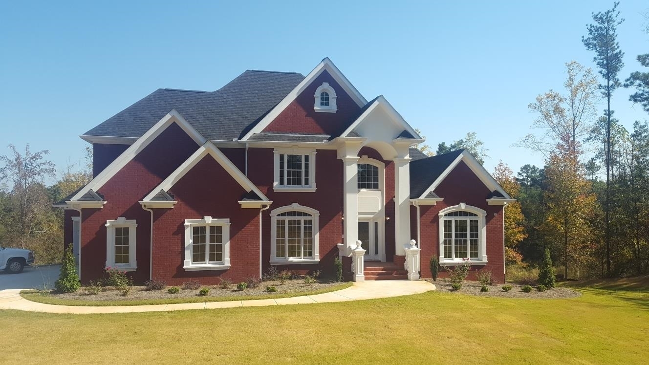 110 Kent Rock Road Loganville, GA 30052 - Photo 12 of 13 a front view of a house with a yard