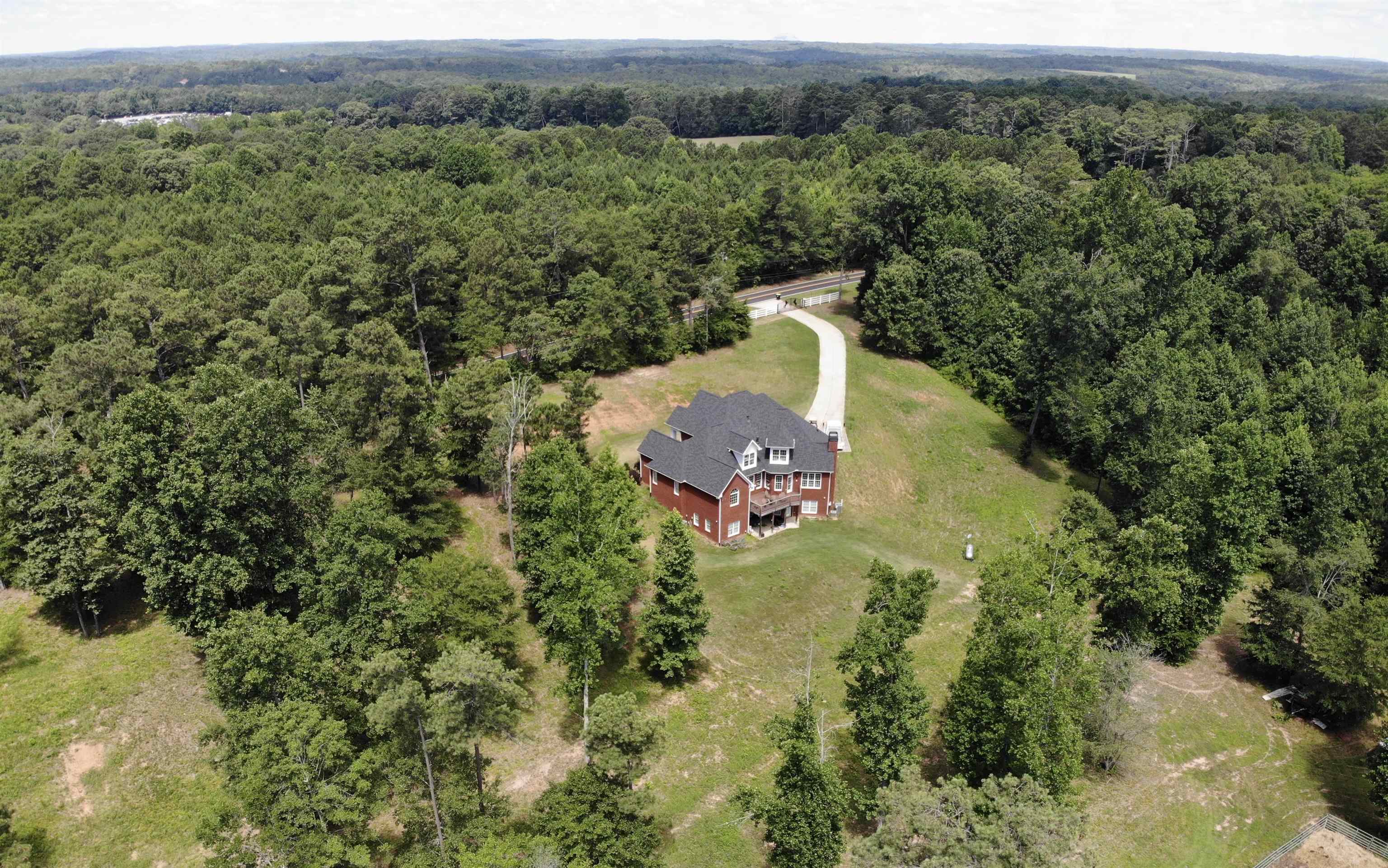 110 Kent Rock Road Loganville, GA 30052 - Photo 2 of 13 an aerial view of a house with a yard