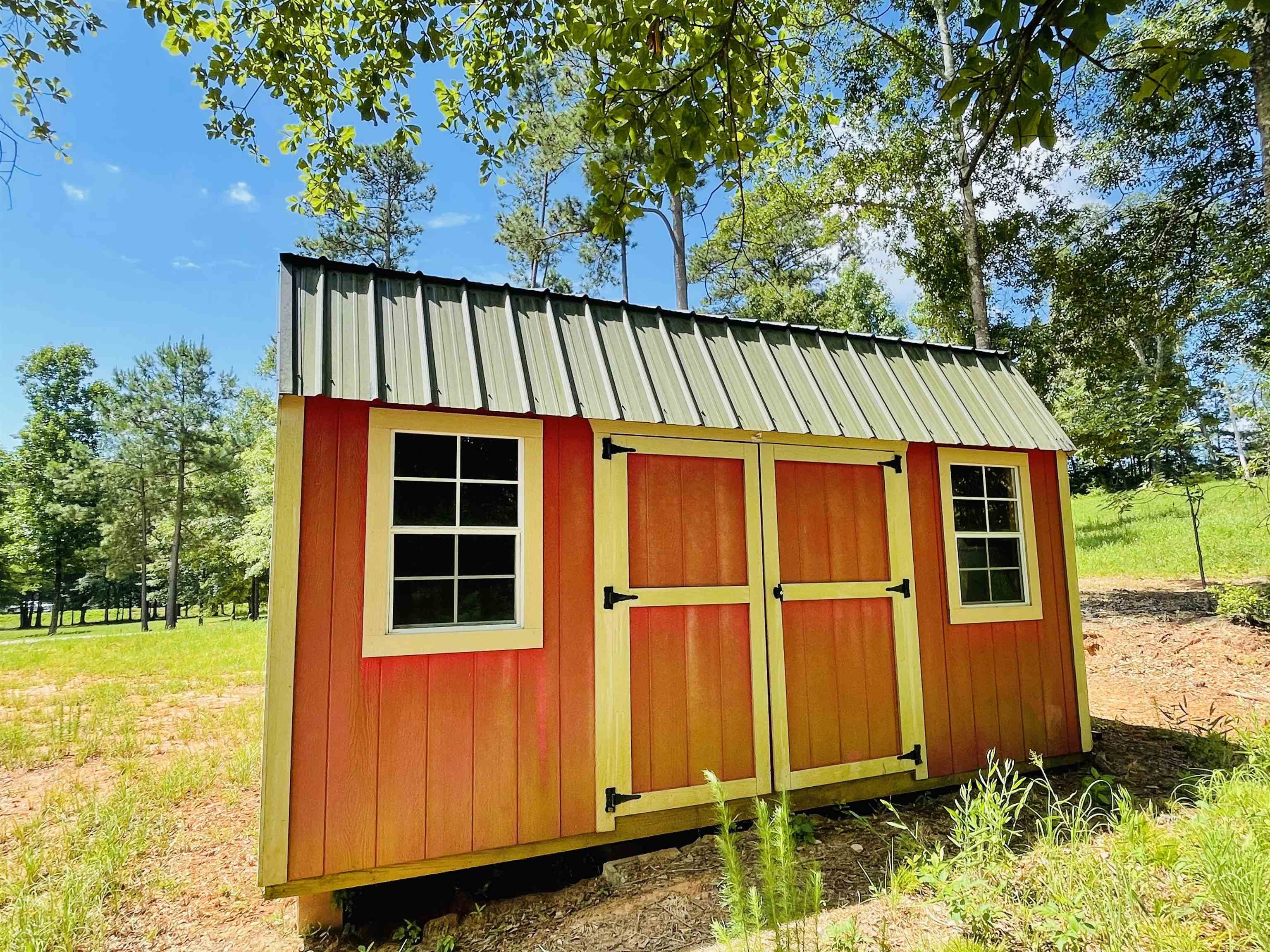 110 Kent Rock Road Loganville, GA 30052 - Photo 8 of 13 a front view of a house with a yard